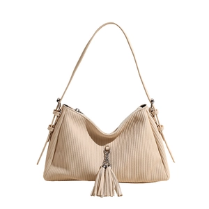 Chic beige pleated tote bag with tassels and silver chain details for women