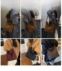 Detailansicht der matten Hobo-Tasche mit Kontrastnähten und großem Fassungsvermögen
