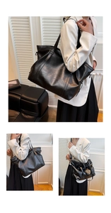 Detail of large black tote bag featuring star rivets and soft pebbled leather texture