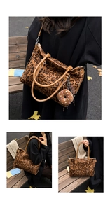 Detail of leopard print tote bag with donut pendant and crossbody strap in autumn setting
