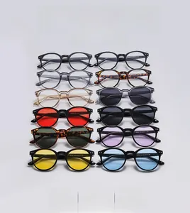 Top view of retro round sunglasses collection in multiple colors and tinted lenses