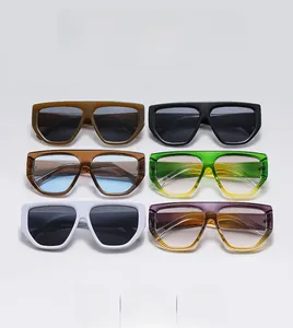 Multiple stylish oversized polygon sunglasses in various colors with thick frames
