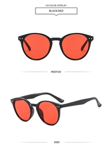 Front and side view of retro round black sunglasses with vibrant red lenses and rivets