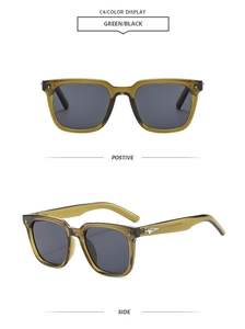 Detail of square green sunglasses featuring silver arrow metal studs and black lenses