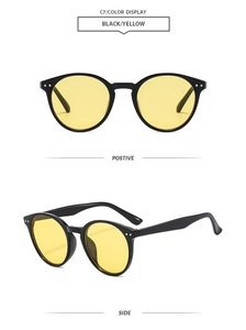 Classic round vintage sunglasses with black frames and yellow lenses from two angles