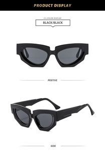 Detail view showing black geometric cat-eye sunglasses from front and side perspectives