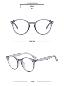 Detail view of transparent grey round frame sunglasses with a retro minimalist design