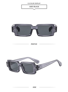 Détail de lunettes de soleil rectangulaires grises avec rivets et verres polarisés