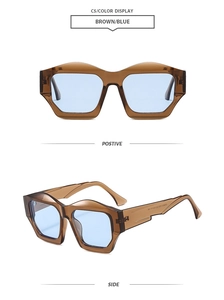 Detail of trendy geometric polygon sunglasses with transparent brown frame and blue lenses