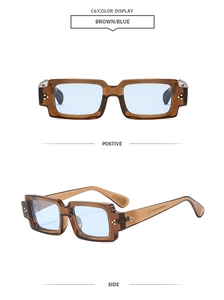 Détail de lunettes de soleil rectangulaires rétro, monture marron et verres bleus