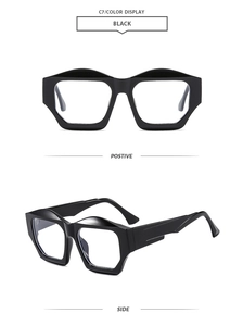 Detail of black geometric chunky sunglasses with wide frames and 3D stepped temples