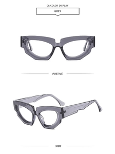 Front and side view of trendy translucent grey cat-eye sunglasses with thick frames