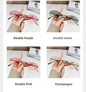 Detail view of four rimless oval sunglasses colors with decorative metal cross accents