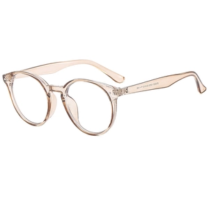 Classic retro round frame sunglasses in champagne pink with clear lenses for street style