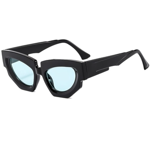 Modern thick-frame cat-eye sunglasses with light blue lenses and black geometric frame