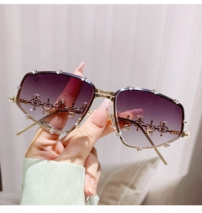 Detailed macro view of gradient purple lenses with luxury rhinestone encrusted frame edges