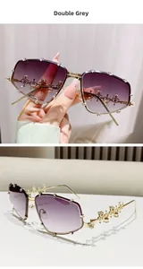Detail of oversized rhinestone sunglasses featuring gradient purple lenses and metal frames
