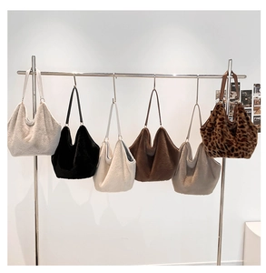 Group view of plush hobo bags in various solid colors and trendy leopard patterns