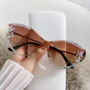 Lunettes de soleil papillon sans monture avec verres dégradés et strass colorés
