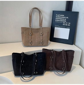 Suede tote bags in light brown, black, and dark coffee with silver rings and side pockets