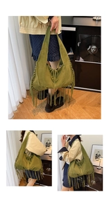 Detail of moss green suede tote bag featuring long fringes and bohemian cross-tie design