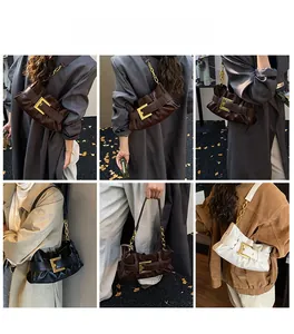 Street style showcasing pleated cloud bags in dark brown, black, and cream colors