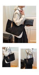 Detail view of black suede tote bag set with wooden beaded charm and matching clutch