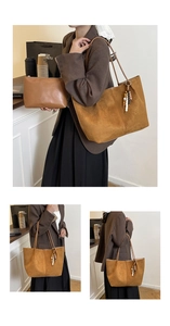 Detail of brown suede tote bag with zipper pouch and bohemian beaded tassel accessory
