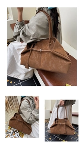 Detail of a brown matte leather tote bag with pleated design and slim adjustable straps