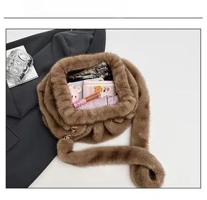 Top view of brown plush crossbody cloud bag showing interior capacity and fuzzy texture