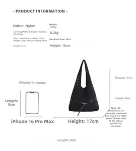 Minimalist black nylon shoulder bag with size comparison to iPhone 16 Pro Max