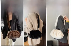 Detail showing plush faux fur pleated clutch bag in brown, black and white tones