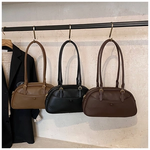 Detailed comparison of vintage bowling shoulder bags in light brown, black, and dark coffee