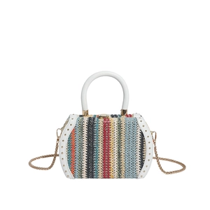 Bohemian multi-colored woven straw bag with white leather handle and gold chain strap