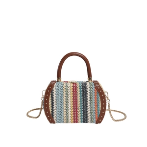 Fashionable colorful striped straw handbag with gold rivets and leather round handles