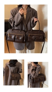 Detail of vintage brown multi-pocket crossbody bag with metallic gold hardware and leather texture