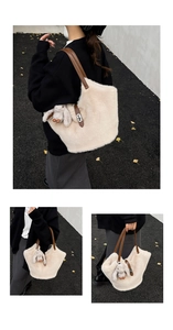 Detail of plush tote bag showing soft faux fur texture and brown leather strap