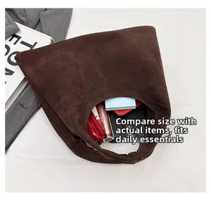 Deep brown matte suede tote bag showing spacious interior with daily essentials inside