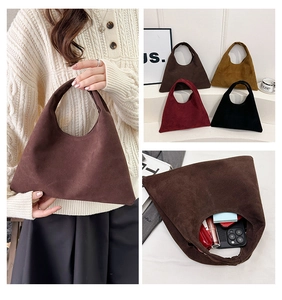 Detail view of suede vintage tote bag showing large capacity for essentials and four colors