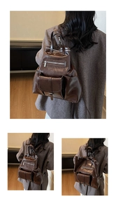 Détails du grand sac cabas marron foncé en cuir avec poches fonctionnelles et aspect brillant