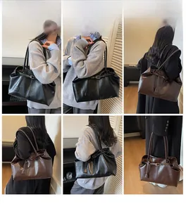 Detailed views of black and dark brown large capacity tote bags with adjustable straps
