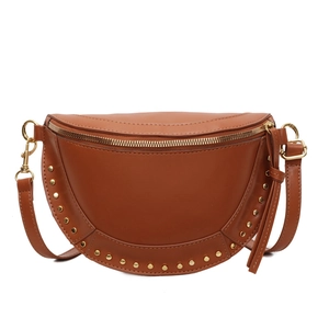Vintage brown leather saddle bag with gold stud trim and adjustable crossbody strap