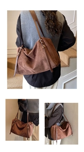 Detailed views of brown suede tote bag featuring vintage metal strap adjustment buckle