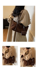 Detail of dark brown frosted tote bag featuring adjustable leather strap and mini coin pouch