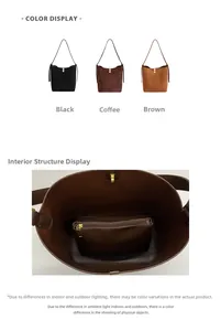 Detailed view of the large bucket bag interior structure with a removable zipper pouch