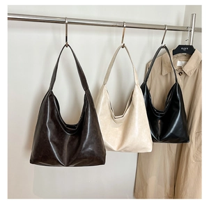 Comparaison détaillée des grands sacs cabas en cuir souple marron, crème et noir
