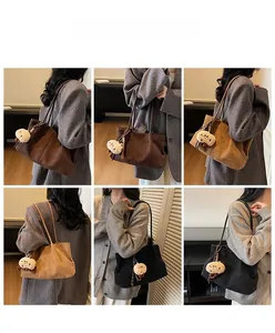 Multiple views of a corduroy tote bag with bear charm worn by a model in soft lighting