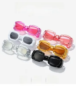 Detailed flat lay of trendy Y2K petal style sunglasses in six vibrant candy colors