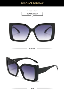 Detail view of square black frames with purple gradient lenses showing side and front profiles