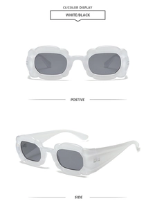 Detail of white petal-shaped Y2K sunglasses with black lenses and side view details